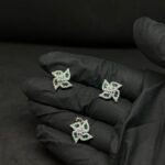 Swastika Green Studded Pendant Set